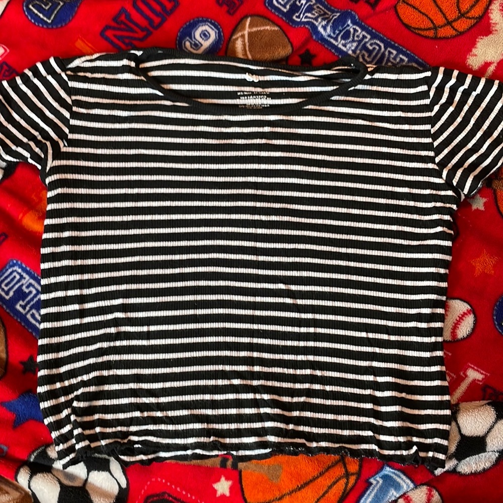 This is a black and white dressy shirt that is great for going out, so soft/cute